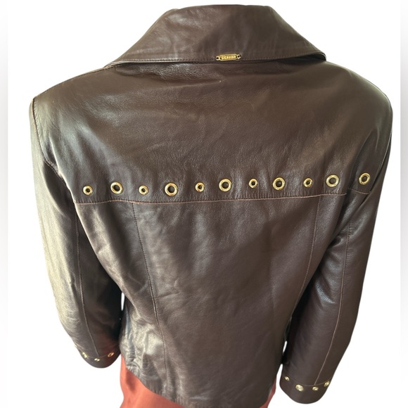 Fabulous St.John Butter Soft Leather
Jacket Embellished w/Brass
Grommets - Picture 5 of 17